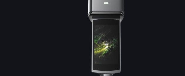XGRIDS L3 integrated touchscreen showing a live colorized point cloud during scanning