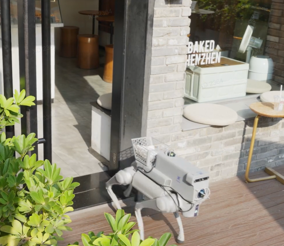 Quadruped robot with a sensor payload navigating a real cafe entrance, closing the sim-to-real loop for robot training.